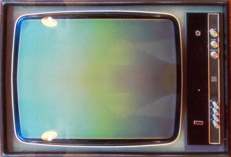 A PNG image of an old brown box television with a gradient screen in blue, green and purple.